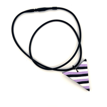 Black tube necklace with striped pendant